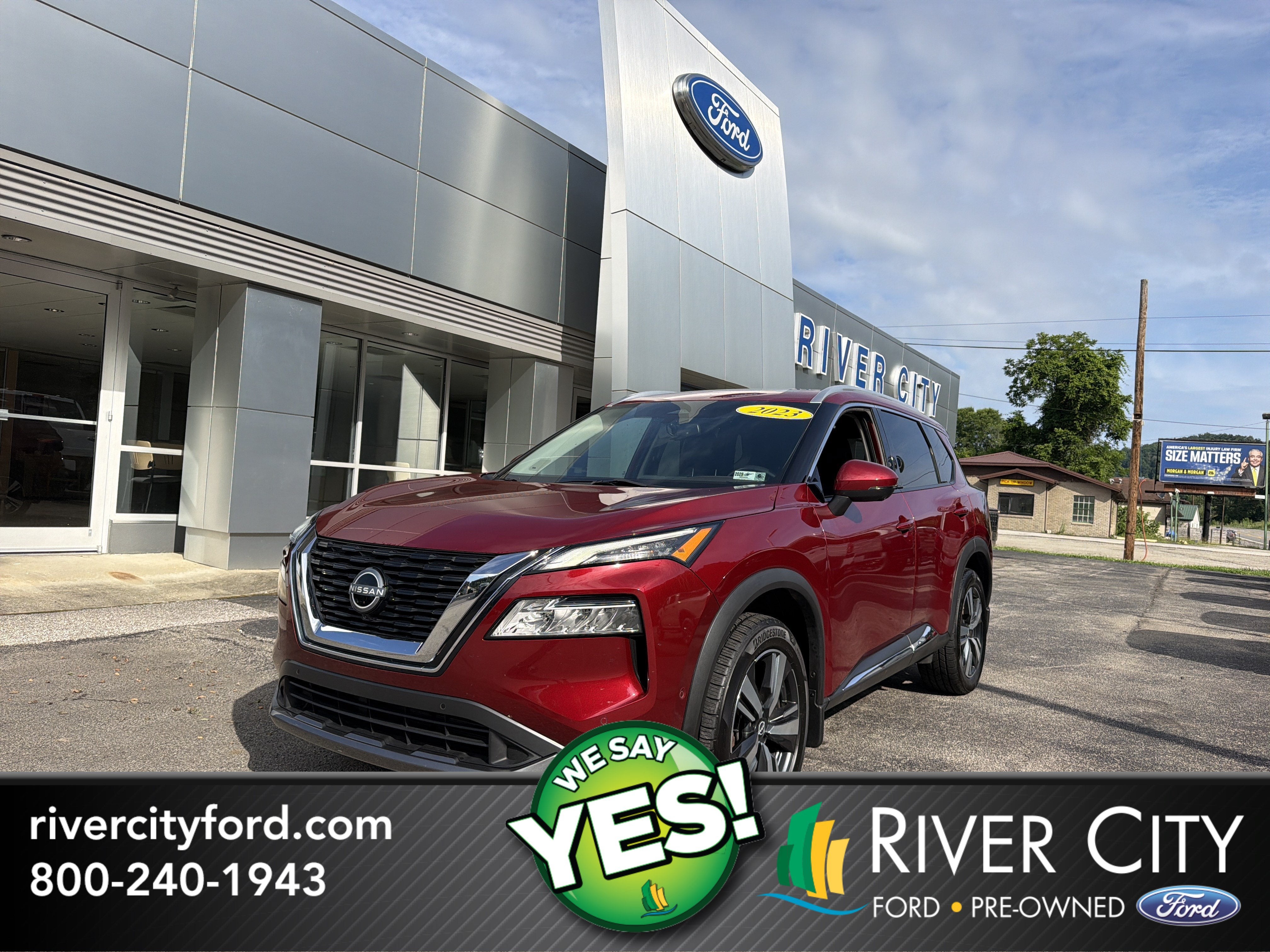 2023 Nissan Rogue SL in Scarlet Ember Tintcoat — front three-quarter view